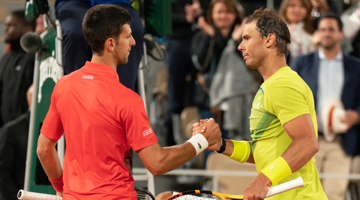 Nadal (phải) thắng 29 trận và thua 30 trận trong những lần đối đầu với Djokovic. Ảnh: AP