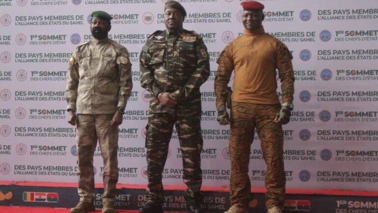 Heads of state of Malis Assimi Goita, Nigers General Abdourahamane Tiani and Burkina Fasos Captain Ibrahim Traore pose for photographs during the first ordinary summit of heads of state and governments of the Alliance of Sahel States (AES) in Niamey, Niger July 6, 2024. REUTERS/Mahamadou Hamidou