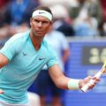 Nadal trong trận đánh đôi với Ruud ở sân Trung tâm tại Bastad, Thụy Điển hôm 15/7. Ảnh: ATP