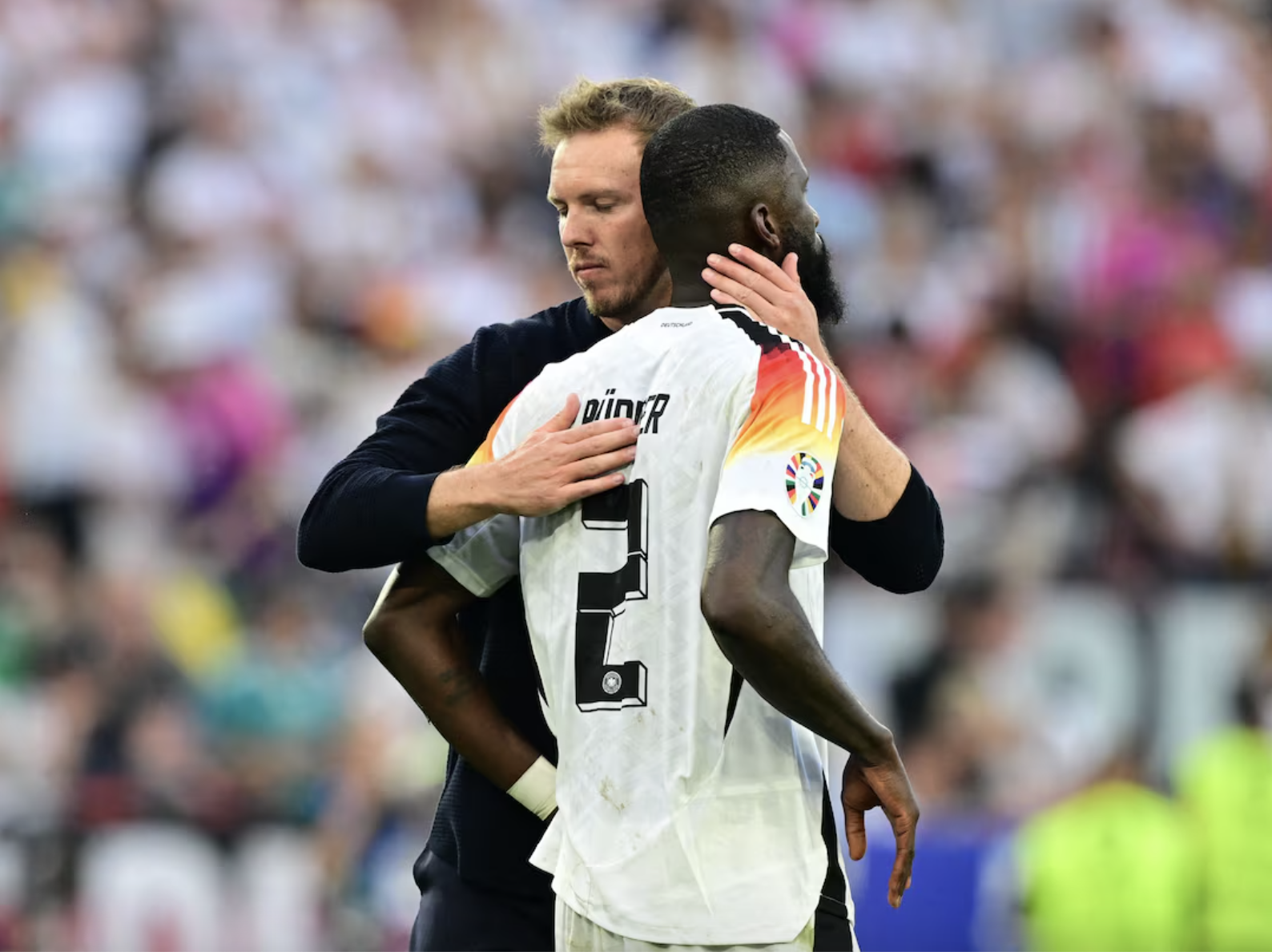 HLV Julian Nagelsmann động viên Antonio Rudiger sau trận Đức thua Tây Ban Nha 1-2 ở tứ kết Euro 2024. Ảnh: Reuters