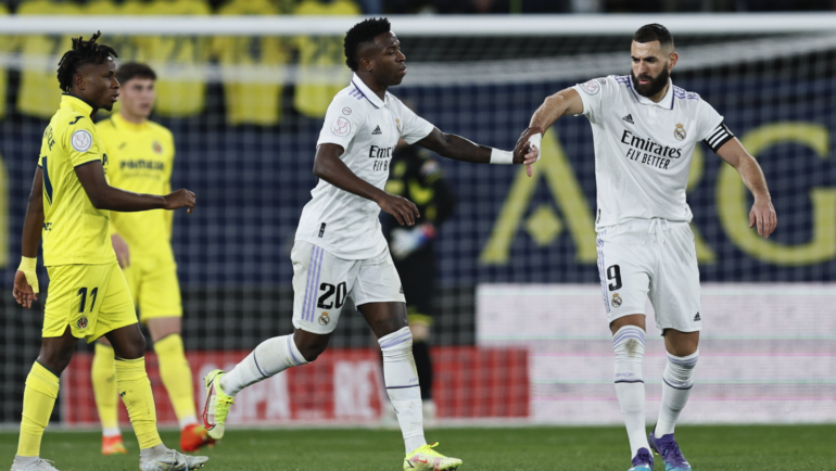 Benzema và Vinicius khi còn sát cánh cùng nhau tại Real. Ảnh: EFE