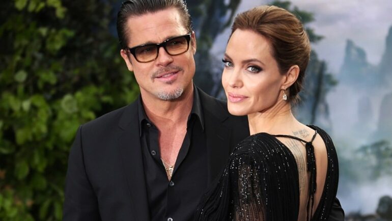 Brad Pitt và Angelina Jolie dự triển lãm The World of Maleficent tại London năm 2014. Ảnh: AP