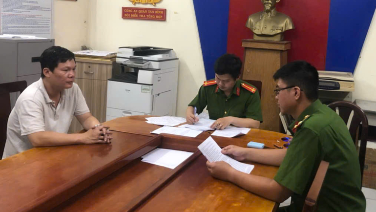 Nguyễn Minh Đức tại cơ quan điều tra. Ảnh: Công an cung cấp