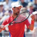 Djokovic giao bóng ở trận gặp Nadal tại vòng hai đơn nam Olympic Paris 2024, trên sân Philippe Chatrier hôm 29/7. Ảnh: Reuters