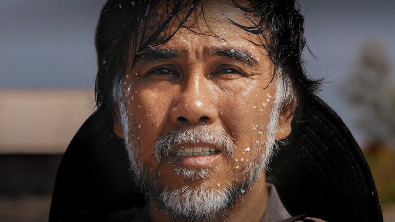 Tạo hình Quyền Linh trong phim Hai Muối. Ảnh: Khang Media