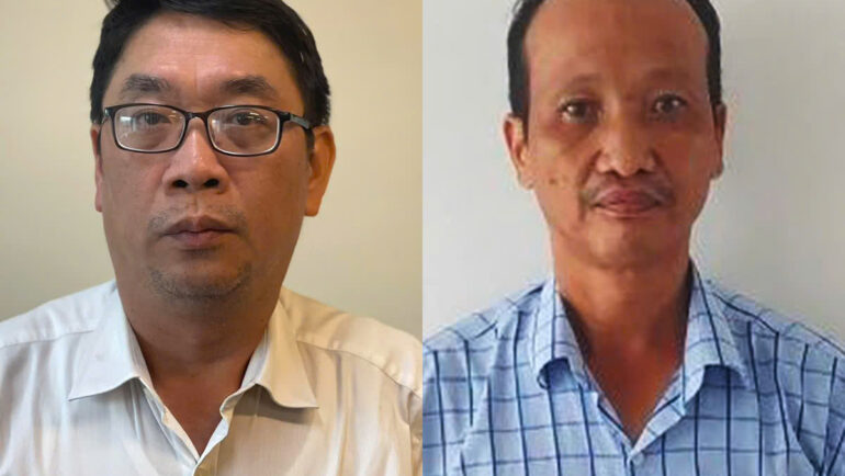 Ông Đinh Minh Hiệp (trái) và Nguyễn Chí Thân tại cơ quan điều tra. Ảnh: Bộ Công an