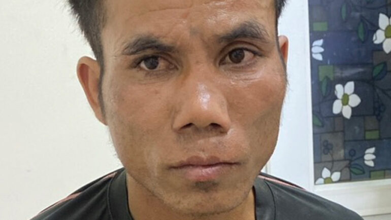 Ksor SiLêm tại cơ quan điều tra. Ảnh: Ngọc Oanh