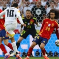 Jamal Musiala sút bóng trúng tay Marc Cucurella trong trận tứ kết Euro 2024, Tây Ban Nha 2-1 Đức hôm 5/7. Ảnh: Reuters